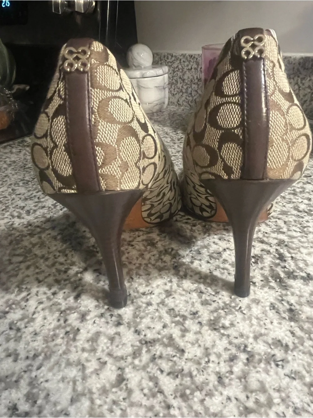 Coach Signature Canvas Pointed-Toe Pumps in Beige